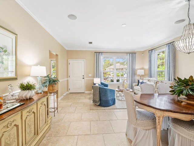 246 Seabreeze Ct, Inlet Beach, FL 32461 - dining area with crown molding and a chandelier