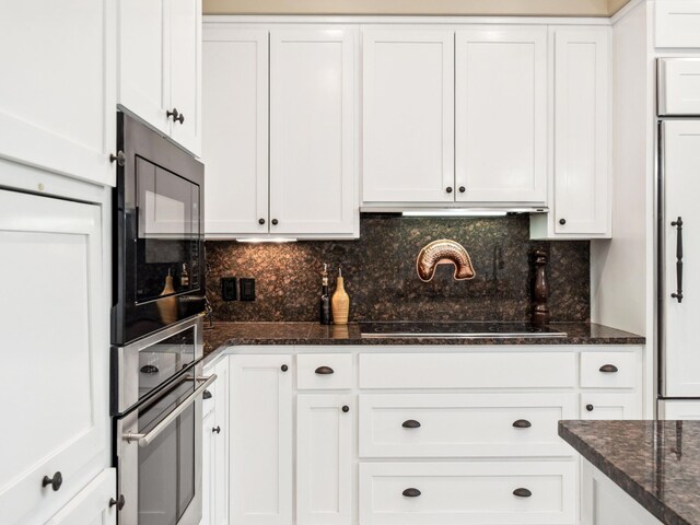 246 Seabreeze Ct, Inlet Beach, FL 32461 - kitchen featuring black appliances and white cabinets