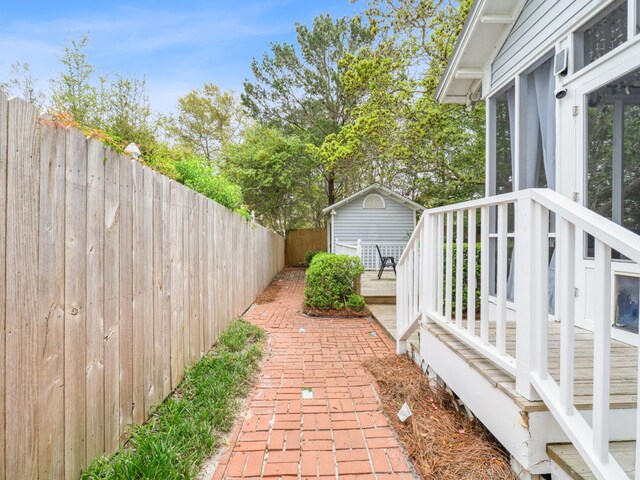 246 Seabreeze Ct, Inlet Beach, FL 32461 - fenced backyard featuring a deck