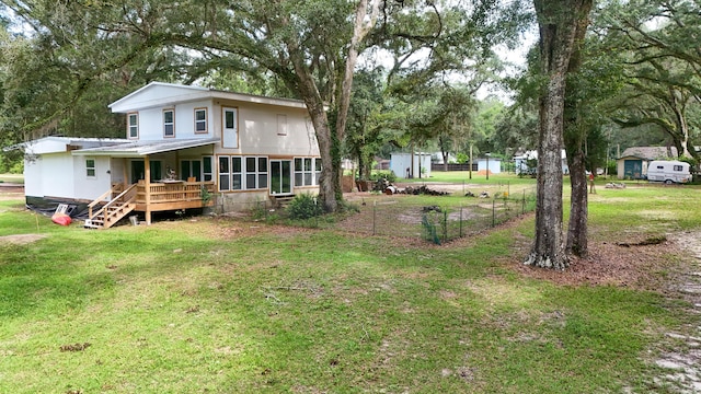 70 River Loop, Ponce De Leon, FL 32455 - back of property featuring a metal roof