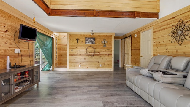 70 River Loop, Ponce De Leon, FL 32455 - living room featuring wooden walls and wood finished floors