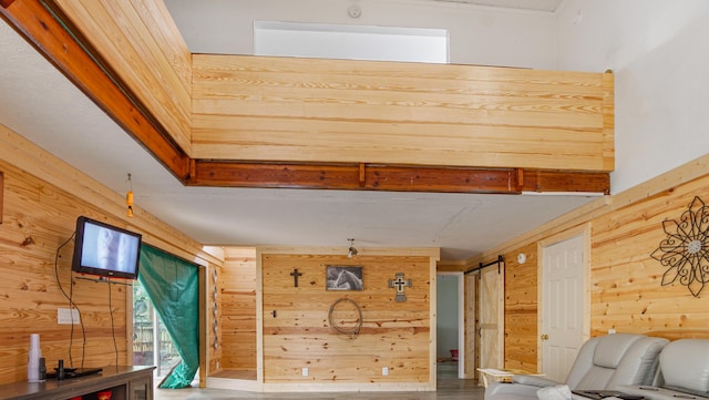 70 River Loop, Ponce De Leon, FL 32455 - living area with wood walls and wood finished floors
