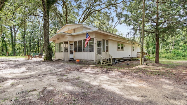 70 River Loop, Ponce De Leon, FL 32455 - view of front of property with a sunroom