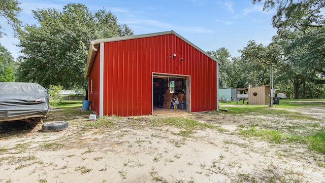 70 River Loop, Ponce De Leon, FL 32455 - view of pole building featuring view of wooded area