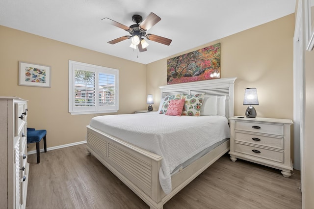 1700 Scenic Highway 98 Unit 101, Destin, FL 32541 - bedroom featuring light wood-style flooring and ceiling fan