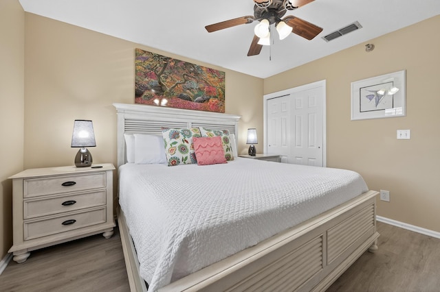 1700 Scenic Highway 98 Unit 101, Destin, FL 32541 - bedroom featuring wood finished floors, a closet, and ceiling fan
