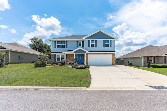 4605 Plover Dr, Crestview, FL 32539 - craftsman-style house featuring brick siding, a garage, concrete driveway, and a front lawn