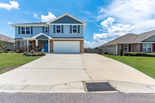 4605 Plover Dr, Crestview, FL 32539 - view of front of property with brick siding, concrete driveway, and a garage