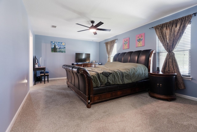 4605 Plover Dr, Crestview, FL 32539 - carpeted bedroom featuring baseboards and ceiling fan
