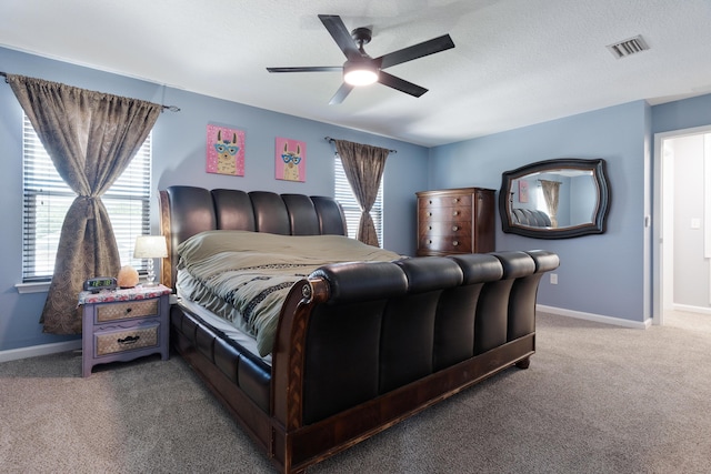 4605 Plover Dr, Crestview, FL 32539 - bedroom with carpet and a ceiling fan