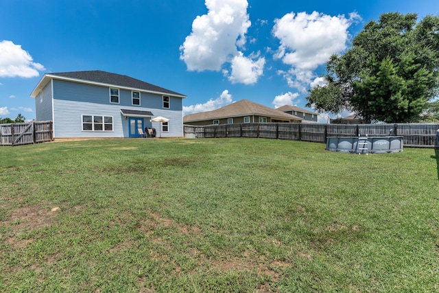 4605 Plover Dr, Crestview, FL 32539 - back of house featuring a fenced backyard