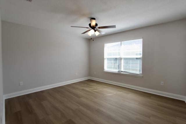 5360 Highview Dr, Crestview, FL 32539 - unfurnished room featuring a ceiling fan and wood finished floors