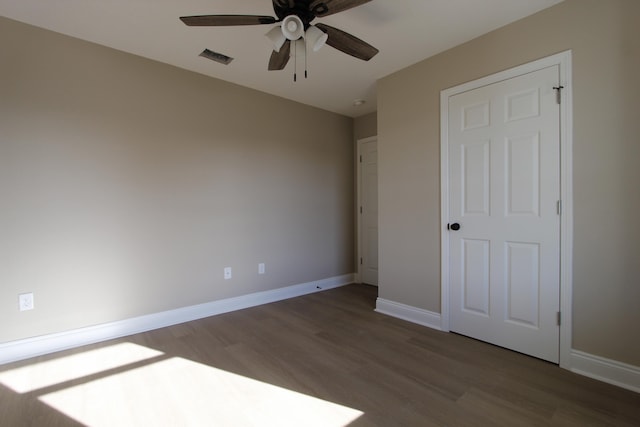 5367 Highview Dr, Crestview, FL 32539 - unfurnished bedroom with wood finished floors and ceiling fan