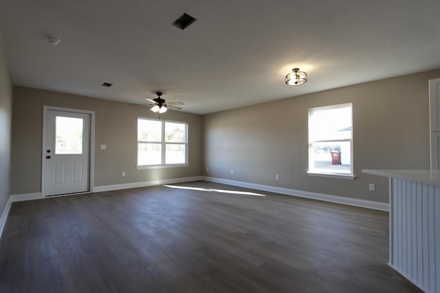 5367 Highview Dr, Crestview, FL 32539 - spare room featuring ceiling fan, dark wood-style flooring, and a smoke detector