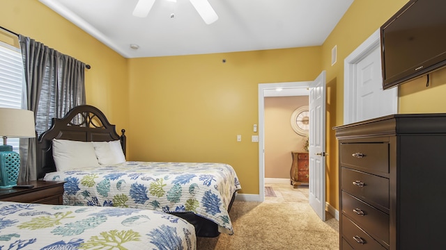 6415 Thomas Dr Unit 1205, Panama City Beach, FL 32408 - bedroom featuring light carpet and ceiling fan