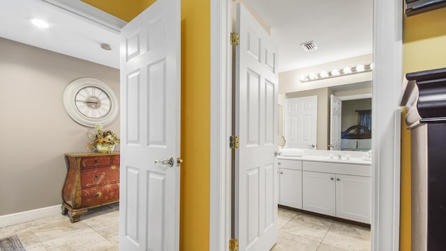 6415 Thomas Dr Unit 1205, Panama City Beach, FL 32408 - bathroom featuring vanity and baseboards