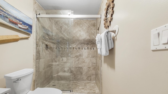 6415 Thomas Dr Unit 1205, Panama City Beach, FL 32408 - bathroom featuring toilet and a stall shower