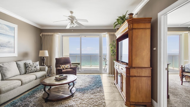 6415 Thomas Dr Unit 1205, Panama City Beach, FL 32408 - living room with ceiling fan, crown molding, and light tile patterned floors