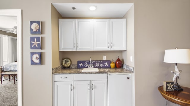6415 Thomas Dr Unit 1205, Panama City Beach, FL 32408 - indoor wet bar with carpet floors