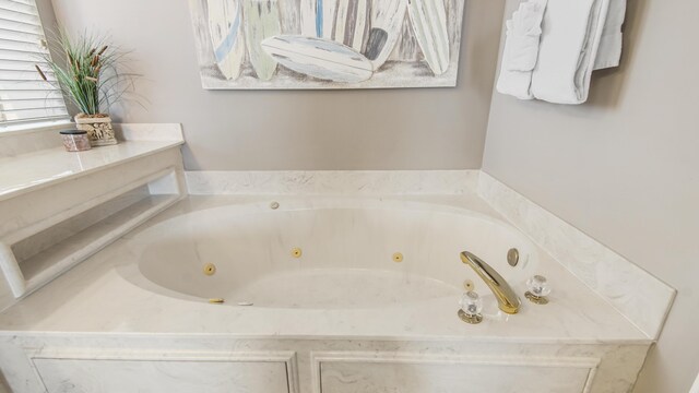 6415 Thomas Dr Unit 1205, Panama City Beach, FL 32408 - bathroom featuring a tub with jets