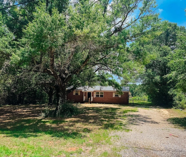 5148 Cavalier Dr, Crestview, FL 32539 - view of yard with gravel driveway