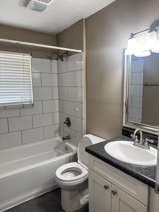 5148 Cavalier Dr, Crestview, FL 32539 - full bathroom featuring vanity, tile patterned floors, bathtub / shower combination, and a textured wall