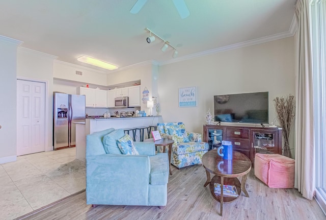 16819 Front Beach Rd Unit 2910, Panama City Beach, FL 32413 - living area featuring ornamental molding, track lighting, light wood finished floors, and a ceiling fan