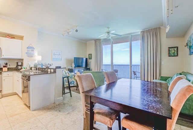 16819 Front Beach Rd Unit 2910, Panama City Beach, FL 32413 - dining space with crown molding, a ceiling fan, rail lighting, and light tile patterned floors
