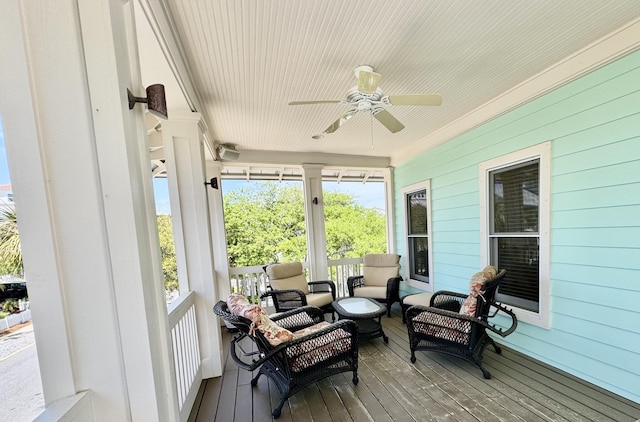 209 Dune Crest Ln, Panama City Beach, FL 32413 - sunroom featuring ceiling fan and an outdoor hangout area