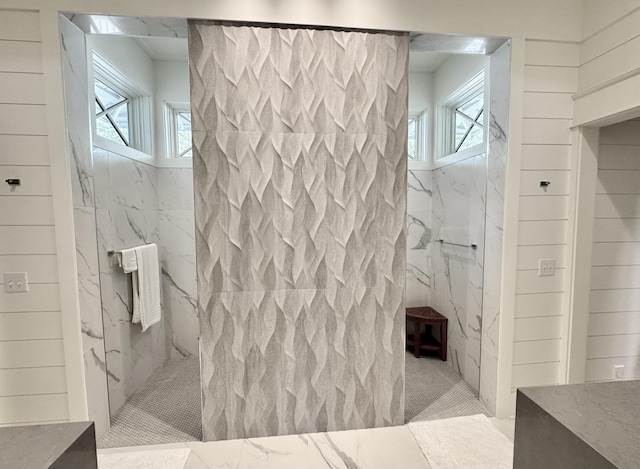 209 Dune Crest Ln, Panama City Beach, FL 32413 - full bathroom featuring healthy amount of natural light and a marble finish shower