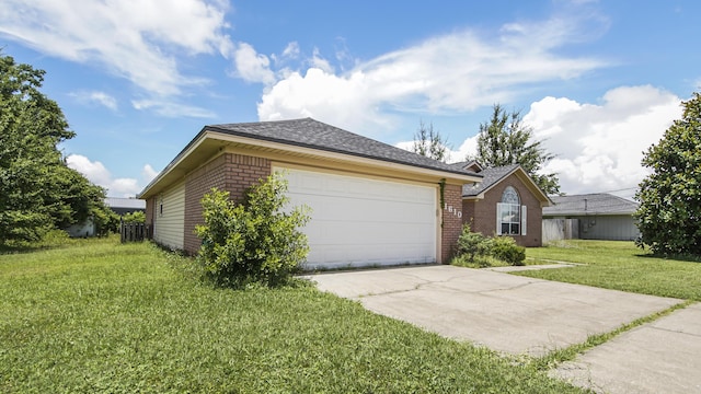 1610 Rhode Island Ave, Lynn Haven, FL 32444 - view of front of house with brick siding, driveway, a garage, a front lawn, and a shingled roof