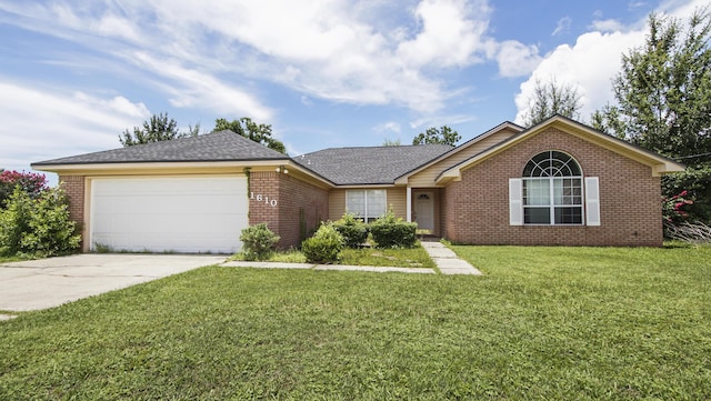 1610 Rhode Island Ave, Lynn Haven, FL 32444 - ranch-style home featuring brick siding, concrete driveway, an attached garage, a front yard, and roof with shingles