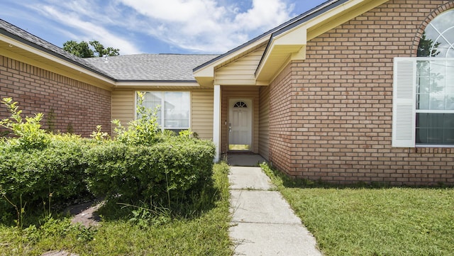 1610 Rhode Island Ave, Lynn Haven, FL 32444 - view of exterior entry featuring brick siding