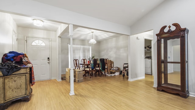 1610 Rhode Island Ave, Lynn Haven, FL 32444 - foyer entrance featuring light wood-type flooring and washer / clothes dryer