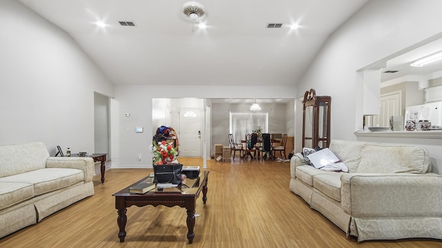 1610 Rhode Island Ave, Lynn Haven, FL 32444 - living room with lofted ceiling and wood finished floors