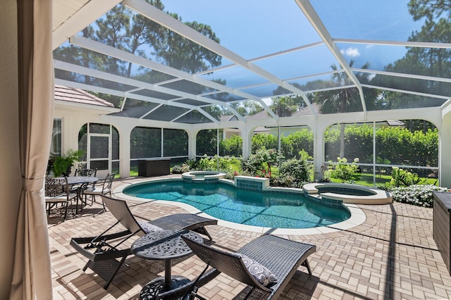 4564 Nautical Ct, Destin, FL 32541 - view of swimming pool with a pool with connected hot tub, a patio, and a lanai