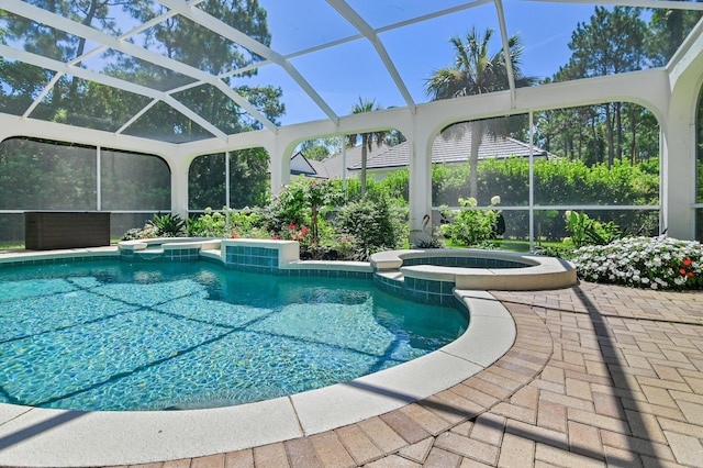 4564 Nautical Ct, Destin, FL 32541 - view of pool featuring a pool with connected hot tub, glass enclosure, and a patio area