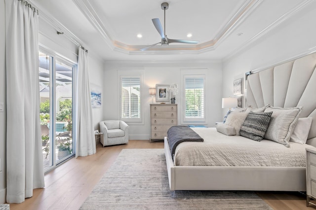 4564 Nautical Ct, Destin, FL 32541 - bedroom featuring multiple windows, ornamental molding, light wood-style floors, a ceiling fan, and recessed lighting