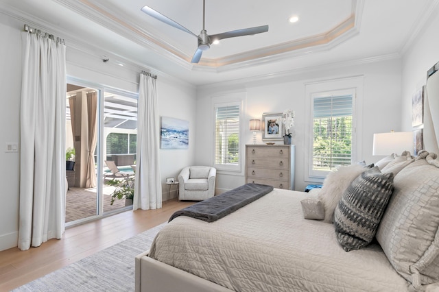 4564 Nautical Ct, Destin, FL 32541 - bedroom featuring access to outside, crown molding, wood finished floors, a raised ceiling, and a ceiling fan