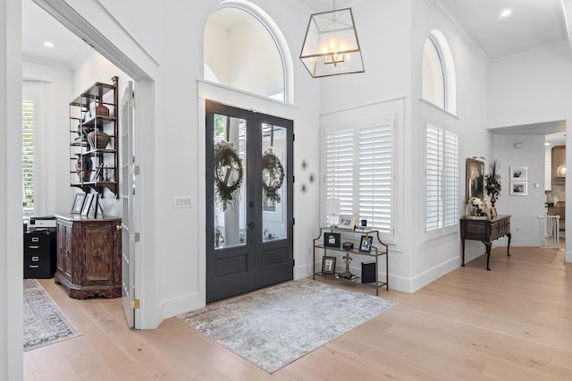 4564 Nautical Ct, Destin, FL 32541 - entrance foyer featuring wood finished floors, plenty of natural light, crown molding, a chandelier, and recessed lighting