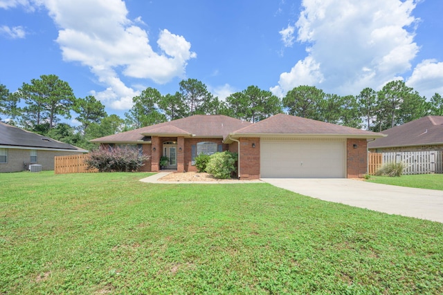 222 Raptor Dr, Crestview, FL 32536 - ranch-style home with driveway, an attached garage, and brick siding