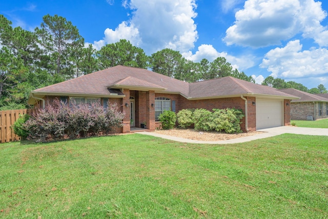 222 Raptor Dr, Crestview, FL 32536 - ranch-style home featuring brick siding, an attached garage, and concrete driveway