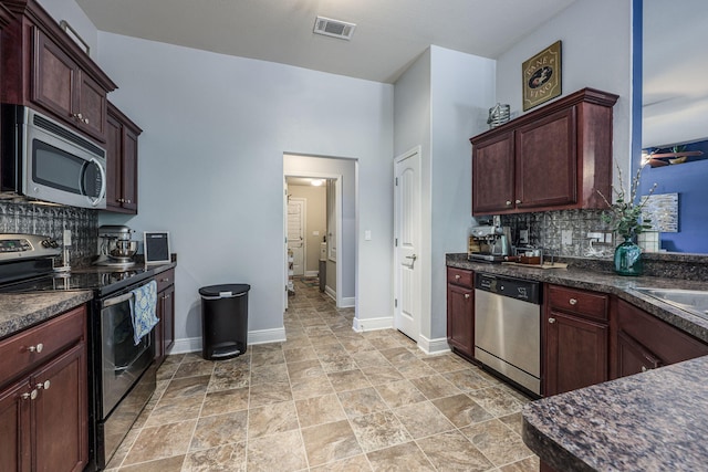 222 Raptor Dr, Crestview, FL 32536 - kitchen featuring appliances with stainless steel finishes, tasteful backsplash, and ceiling fan