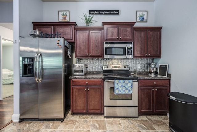 222 Raptor Dr, Crestview, FL 32536 - kitchen with stainless steel appliances and backsplash