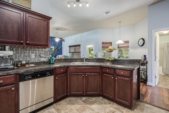 222 Raptor Dr, Crestview, FL 32536 - kitchen with dishwasher, hanging light fixtures, decorative backsplash, a peninsula, and ceiling fan