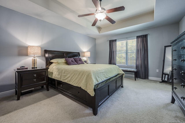 222 Raptor Dr, Crestview, FL 32536 - bedroom with light colored carpet, a raised ceiling, and a ceiling fan
