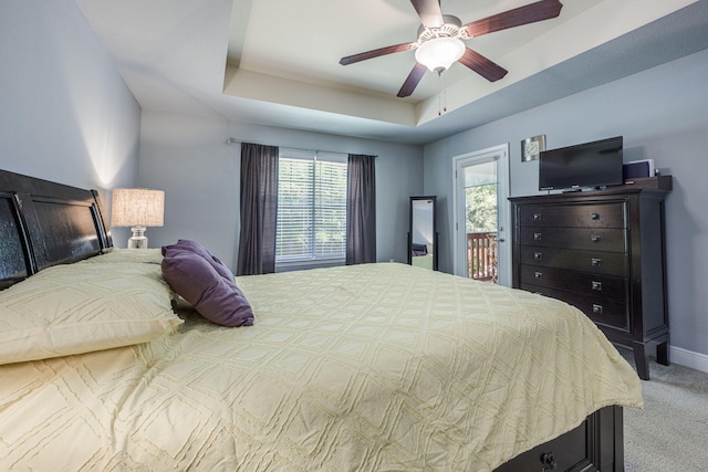222 Raptor Dr, Crestview, FL 32536 - bedroom with carpet flooring, a raised ceiling, ceiling fan, and access to exterior
