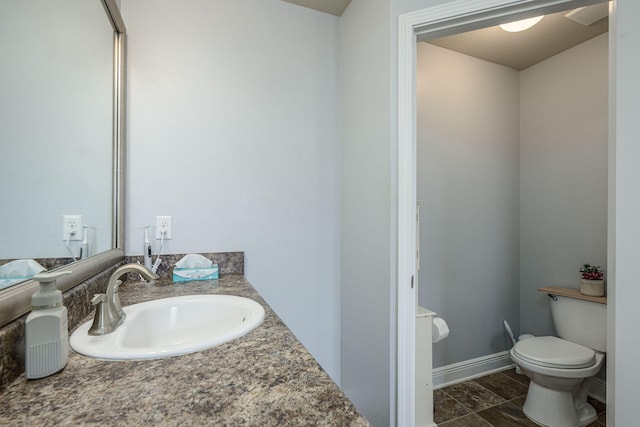 222 Raptor Dr, Crestview, FL 32536 - half bathroom featuring toilet and vanity