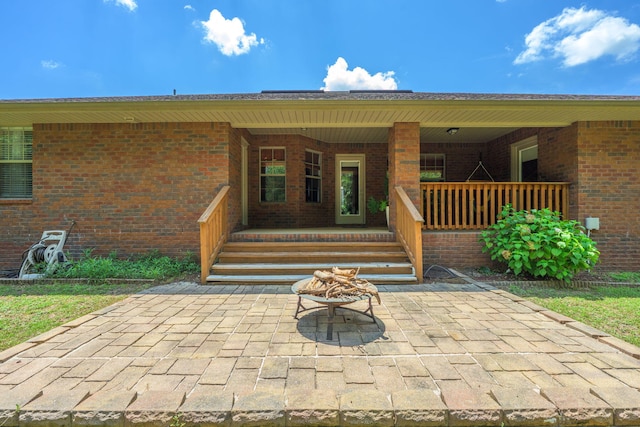222 Raptor Dr, Crestview, FL 32536 - entrance to property with brick siding and a porch