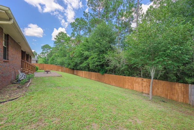 222 Raptor Dr, Crestview, FL 32536 - fenced backyard with a patio area